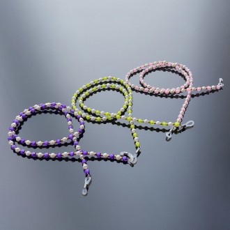 A chain for glasses, beads, an orange pendant